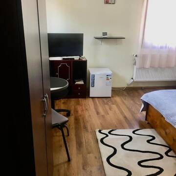 Фото номера Cемейный номер с собственной ванной комнатой Проживание в семье Casa Royce г. Азуга 21