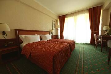 Фото номера Семейный номер Отель Lux Garden Hotel г. Азуга 4